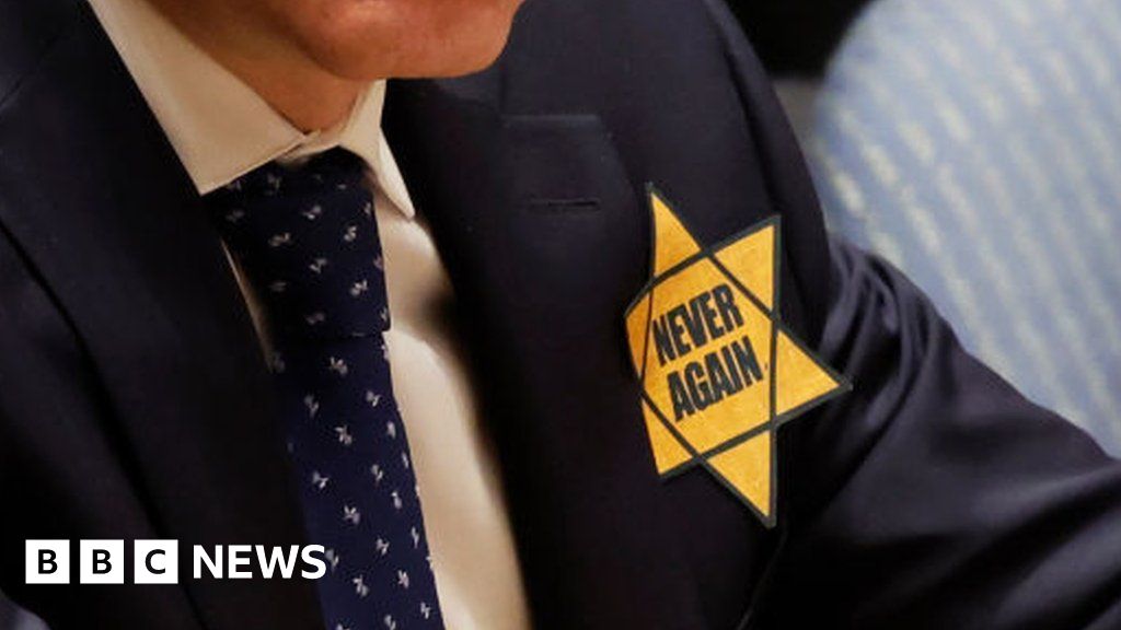 Israel's UN ambassador pins yellow star to chest