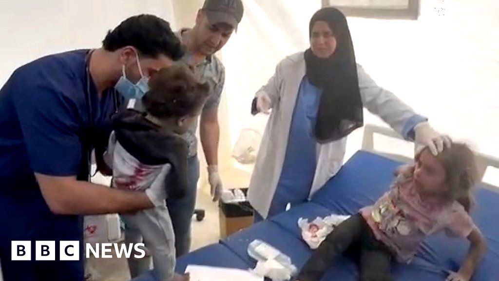 Moment injured Gaza girl, 5, sees baby sister is alive