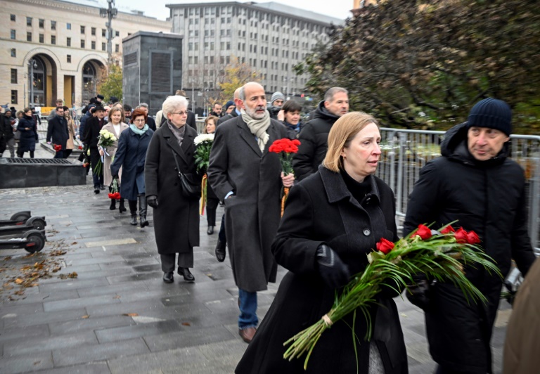 Foreign envoys including US Ambassador Lynne Tracy lays flowers in memory of the victims of the vicitms of Stalin