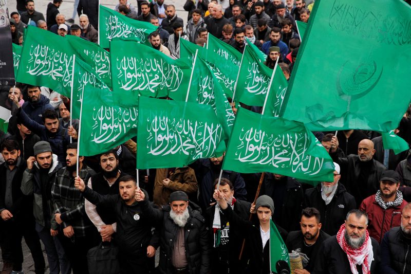 Pro-Palestinian demonstrators attend a funeral prayer in Istanbul