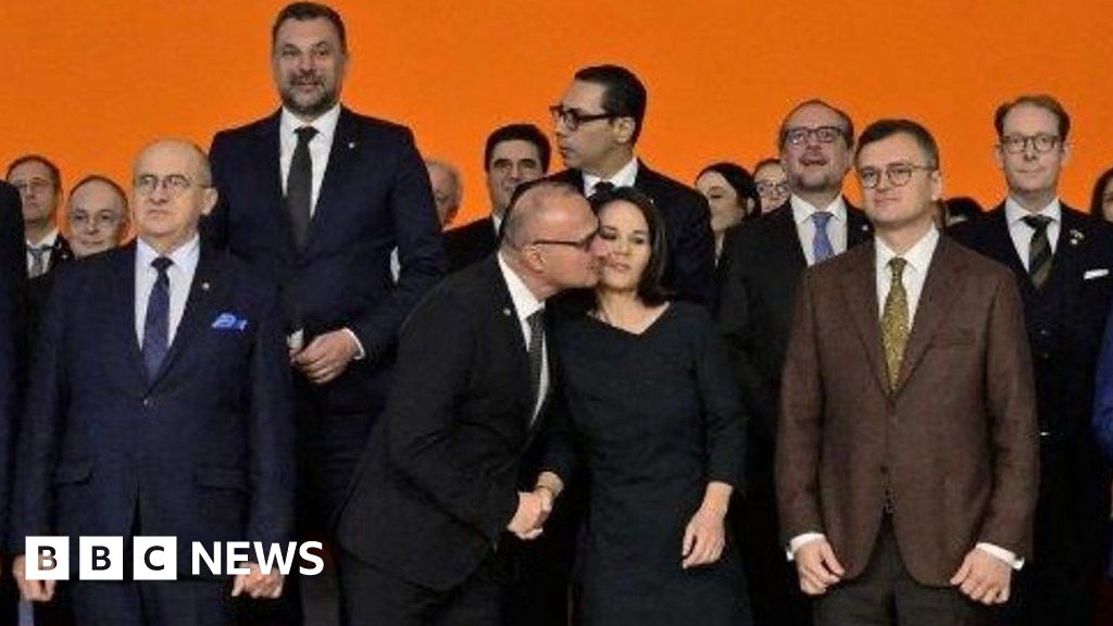 Minister's awkward EU summit kiss causes controversy