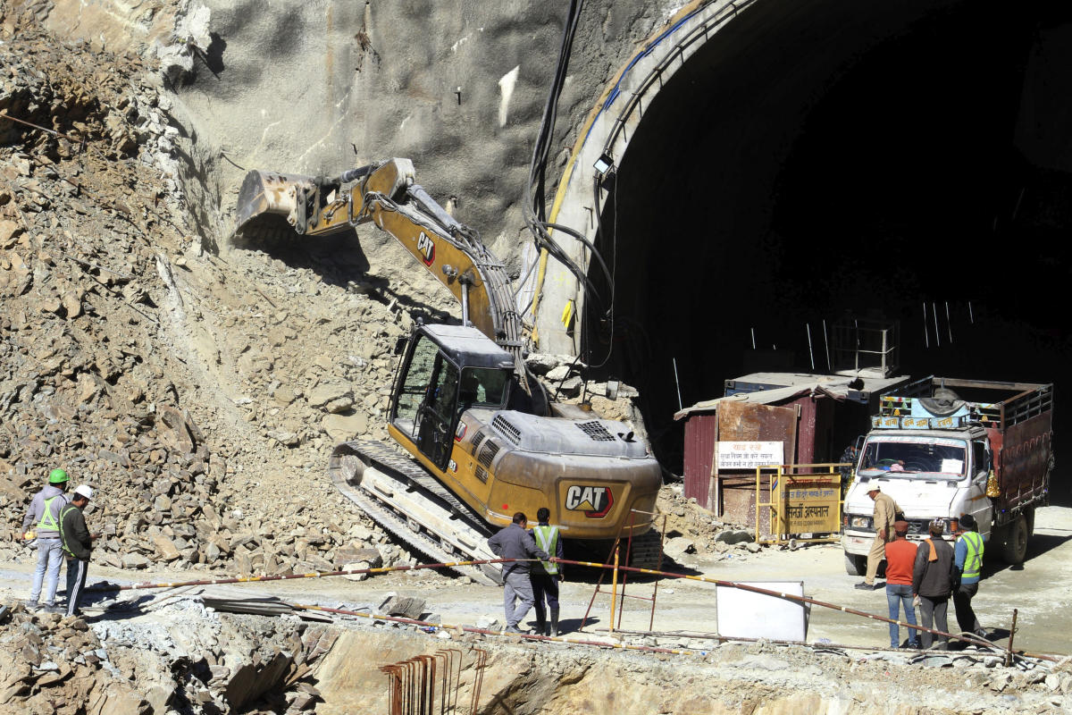 Blocked from a horizontal route, rescuers will dig vertically to reach 41 trapped in India tunnel