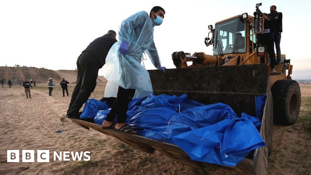Israel Gaza: Drone shots show Palestinians buried in Rafah mass grave