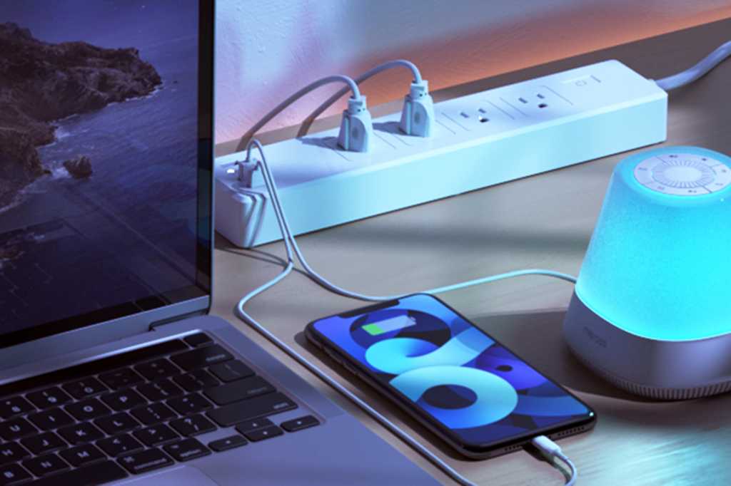 meross smart power strip with a macbook and iphone
